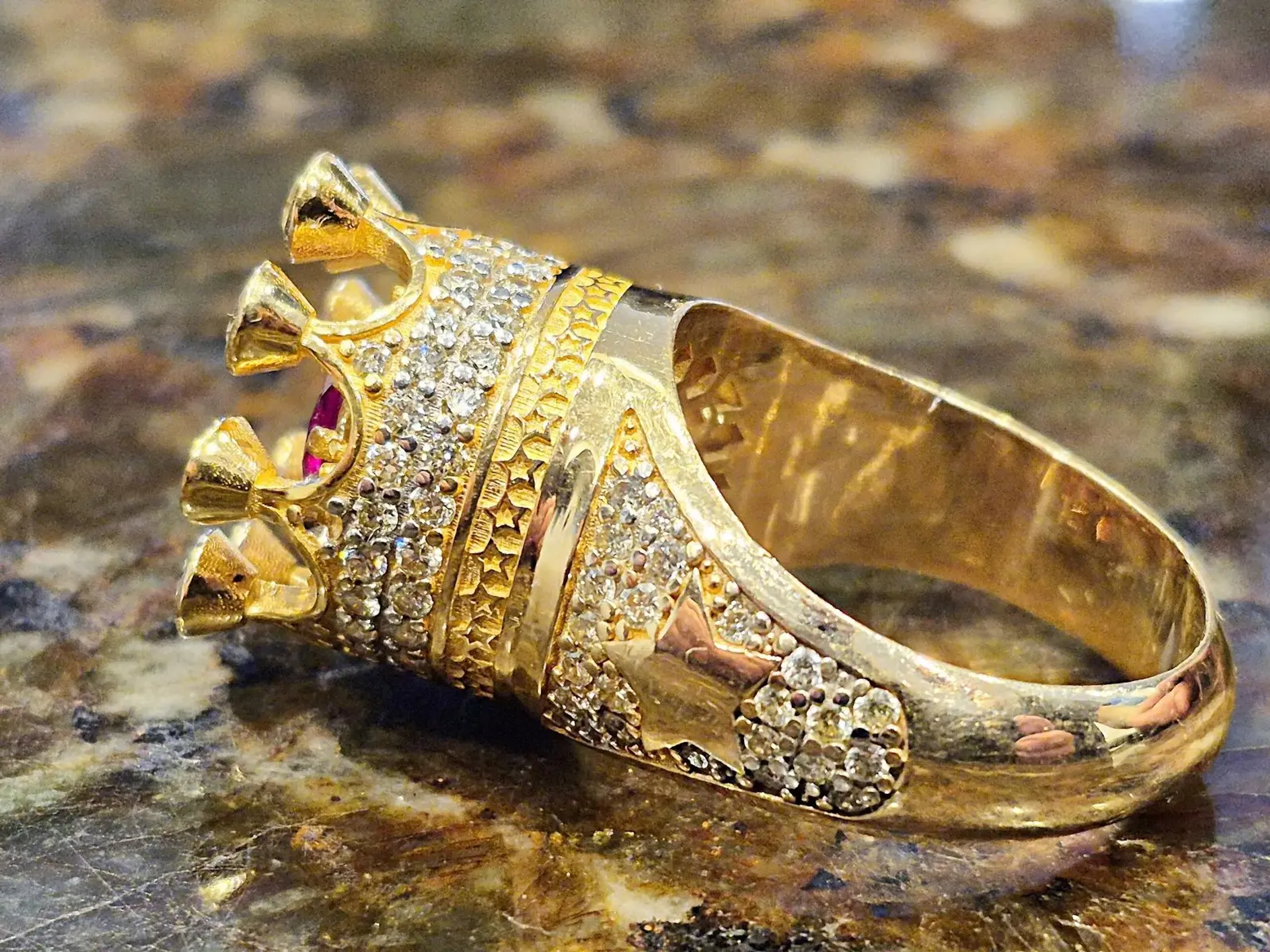 Diamond-set gold ring at Triple Diamond