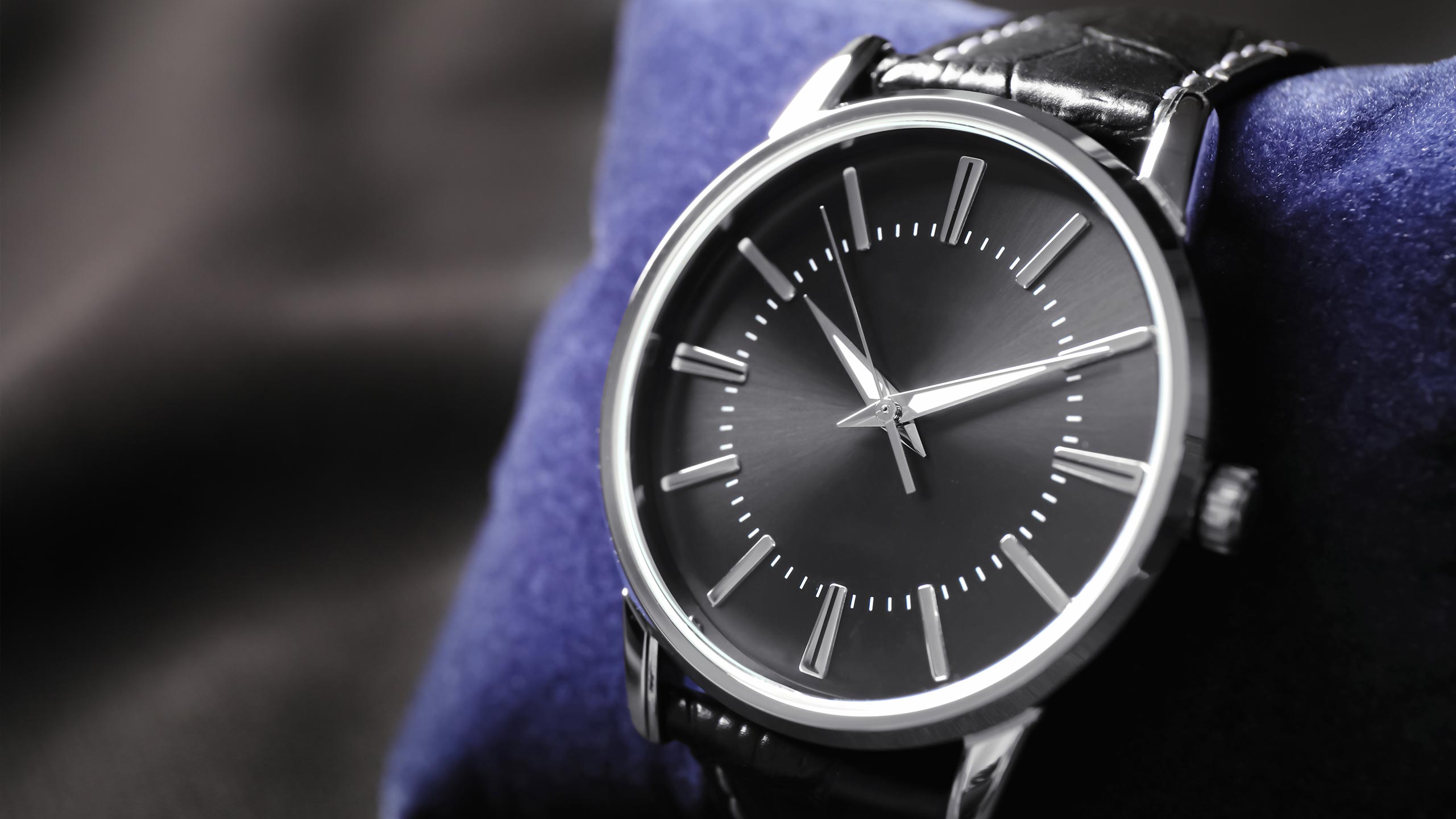 Classic leather-strap luxury watch at Triple Diamond